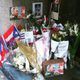 Fidel Castro supporters leave Cuban flags, photos, letters and flowers outside of the Cuban Permanent Mission At United Nations in New York City. (Dec. 3, 2016)